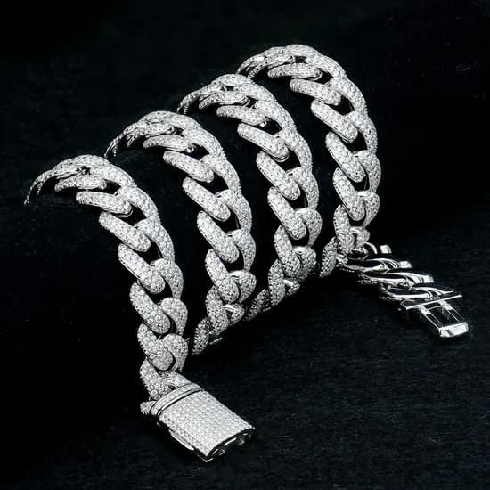 Iced Cuban chain bracelet on a dark background