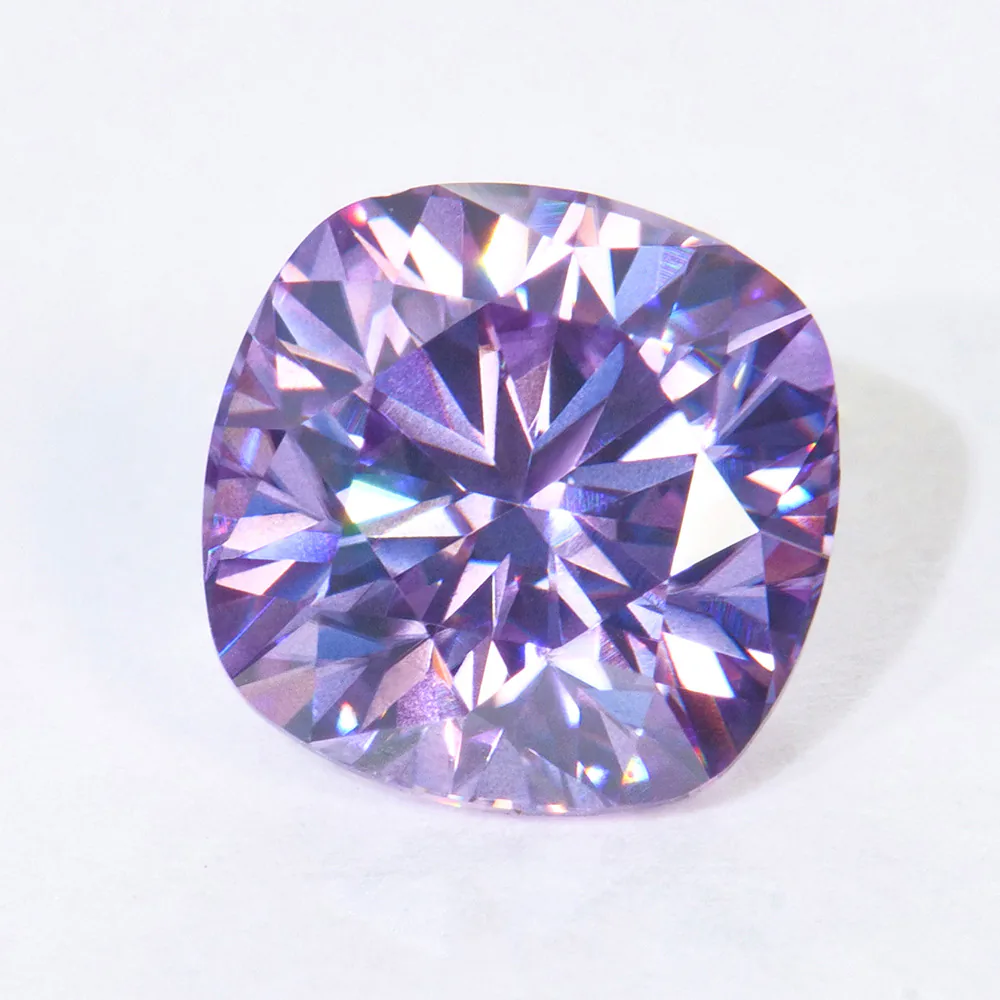 Purple lab-grown colored gemstones in mixed cuts on a white background